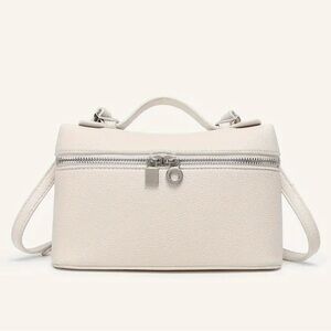 Elegant Cream Handbag with Silver Zipper